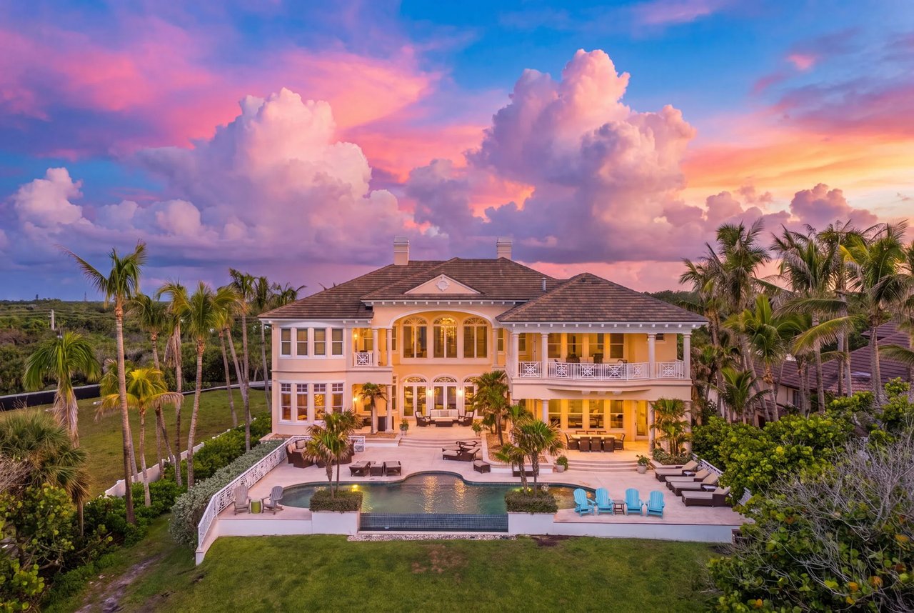 The rear elevation of 211 Beachside Drive at twilight, a still from the cinematic film tour