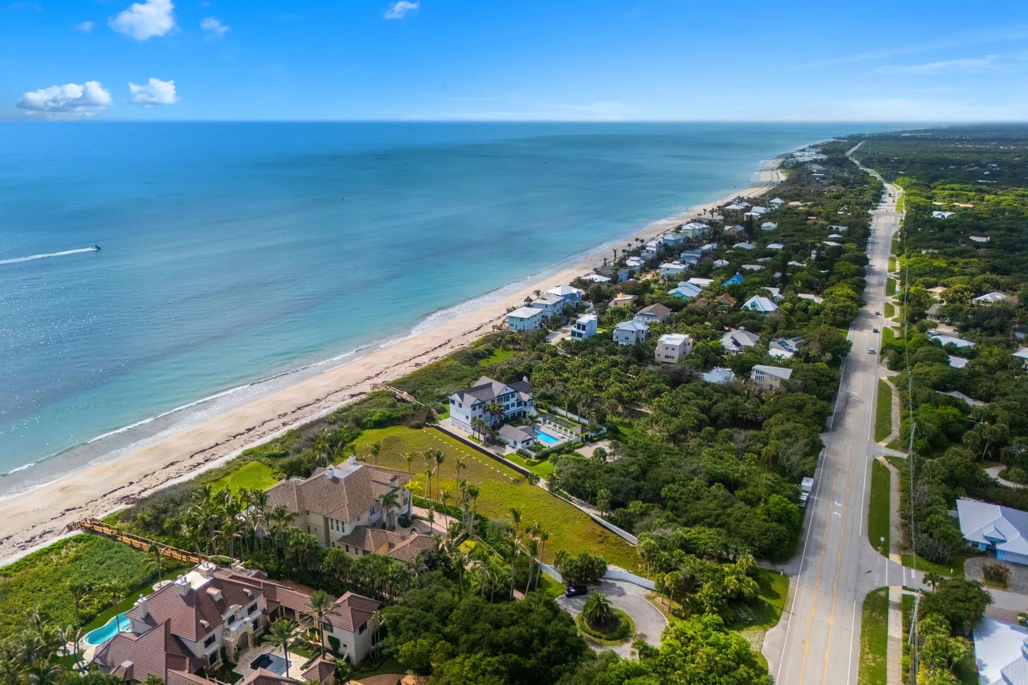 Aerial sweep along A1A and the Atlantic shoreline north of the estate