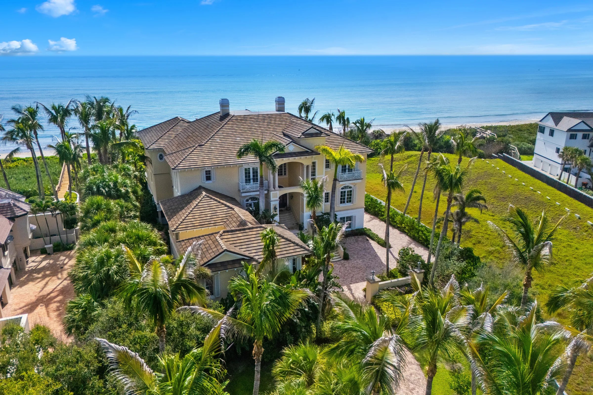 Aerial of the estate from the Atlantic over 122 feet of Atlantic shoreline stretching north toward Sebastian Inlet