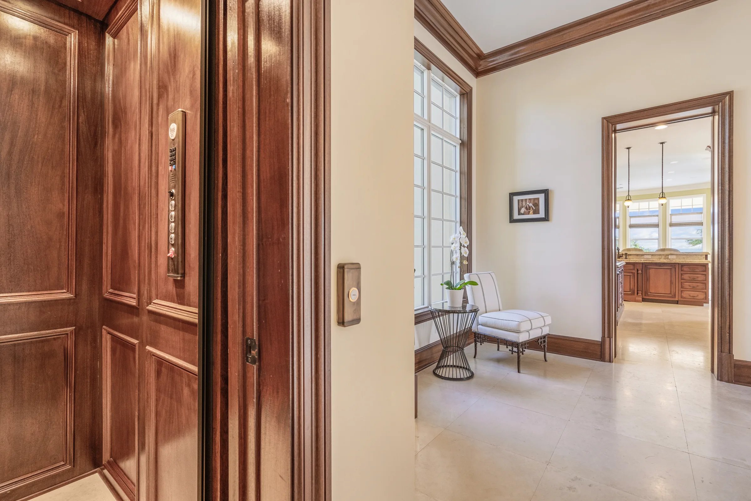 Paneled elevator car and hallway