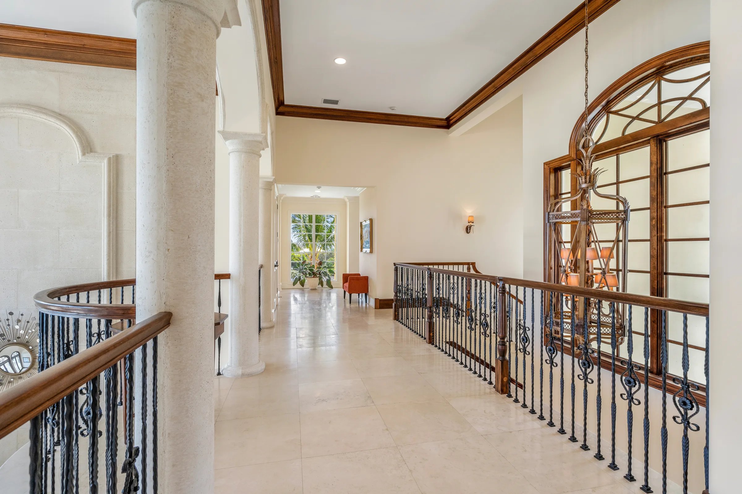 Second-floor gallery columns and balustrade