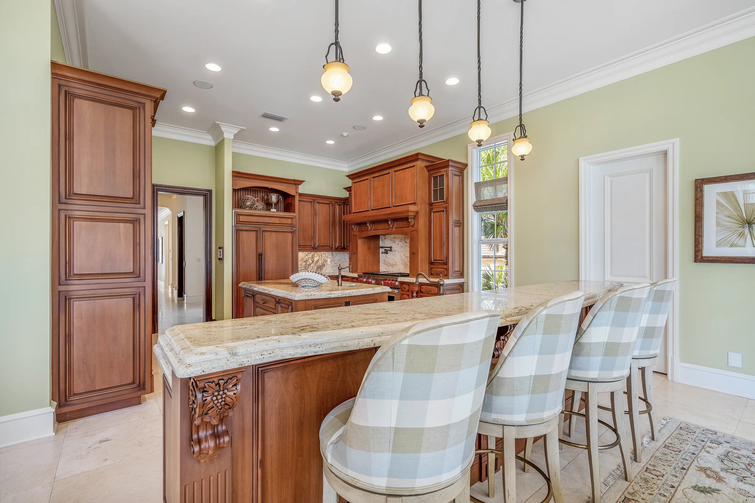 Kitchen counter with bar stools
