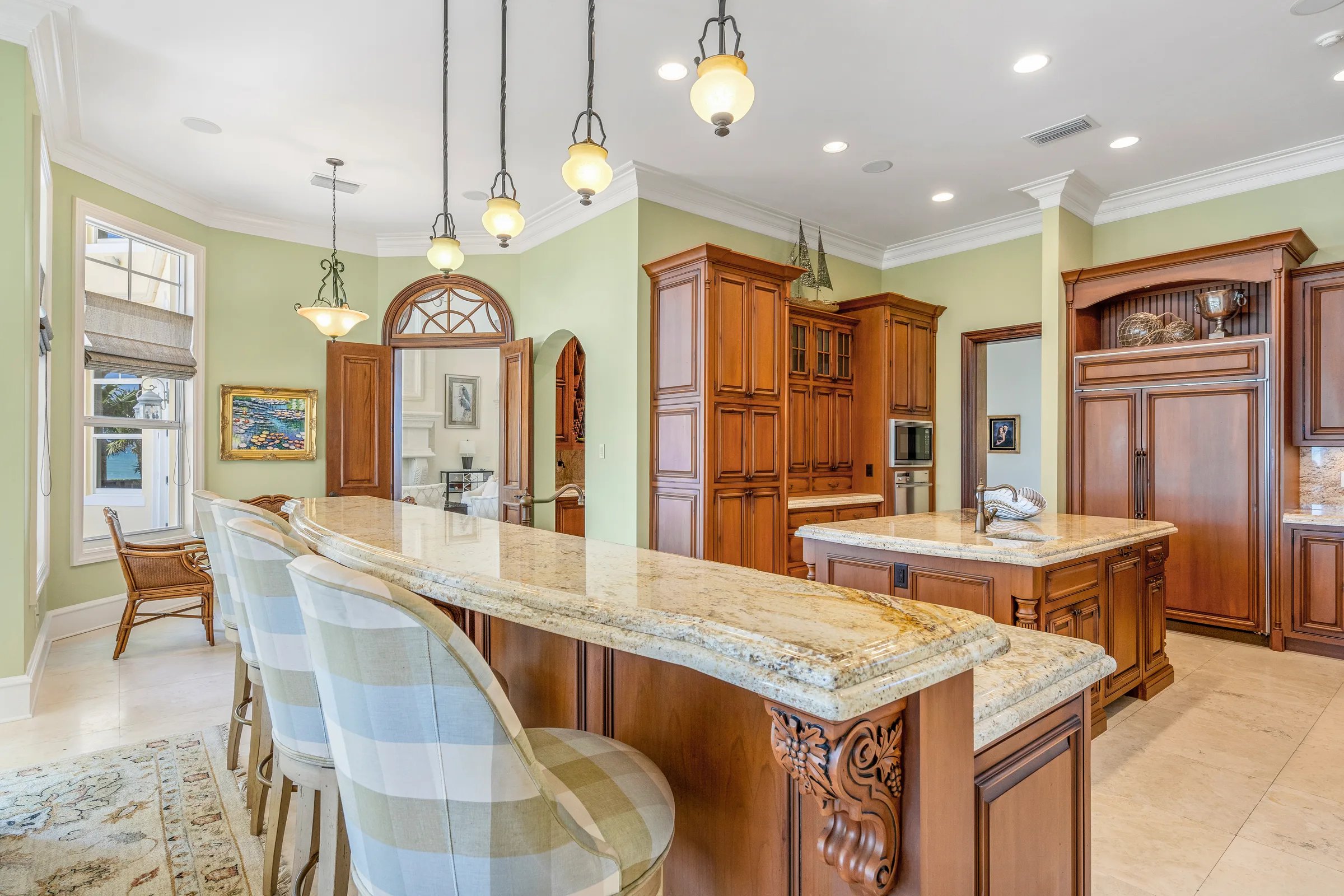 Kitchen looking out to bay-window seating