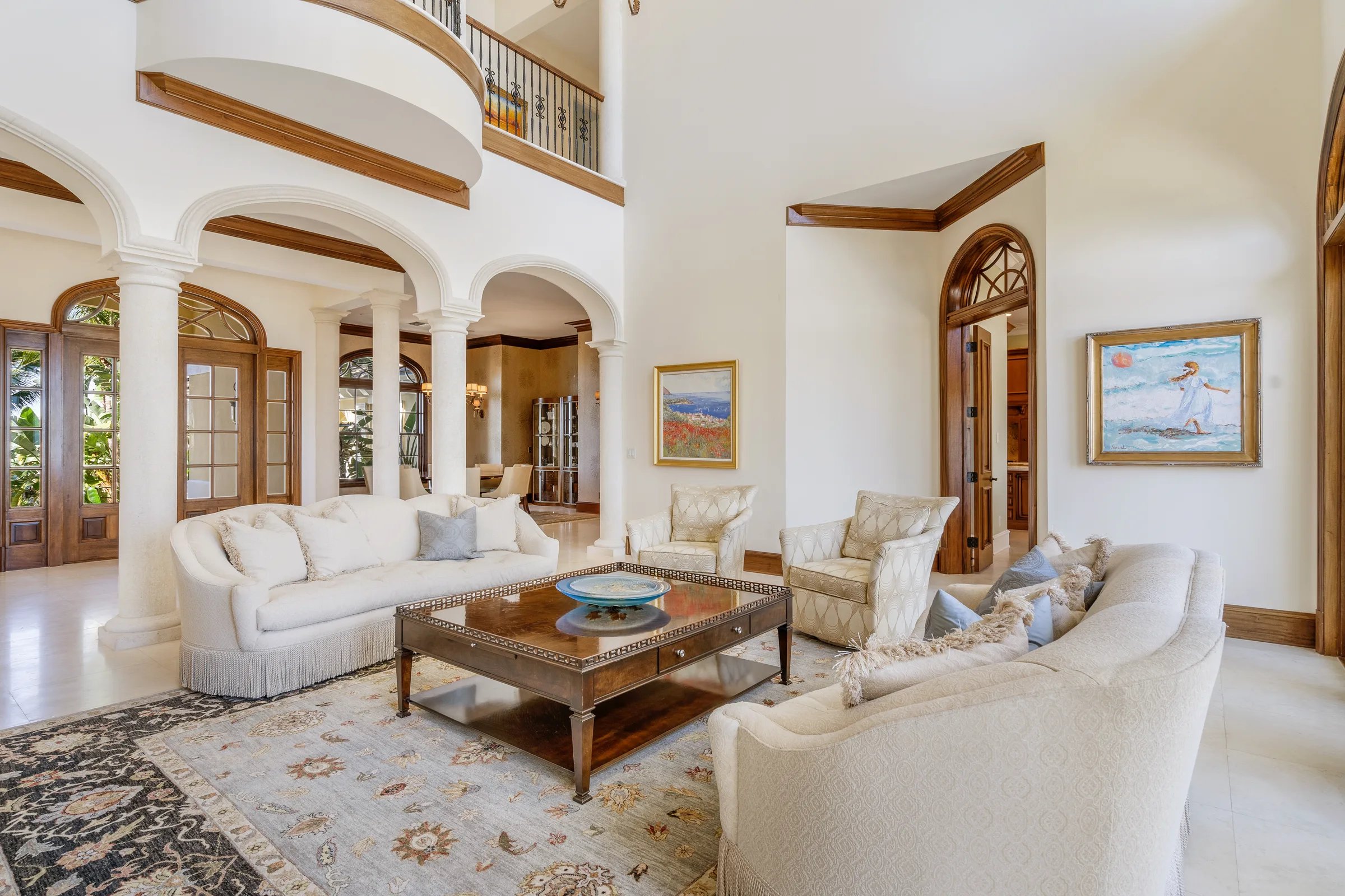 Great room with double-height windows