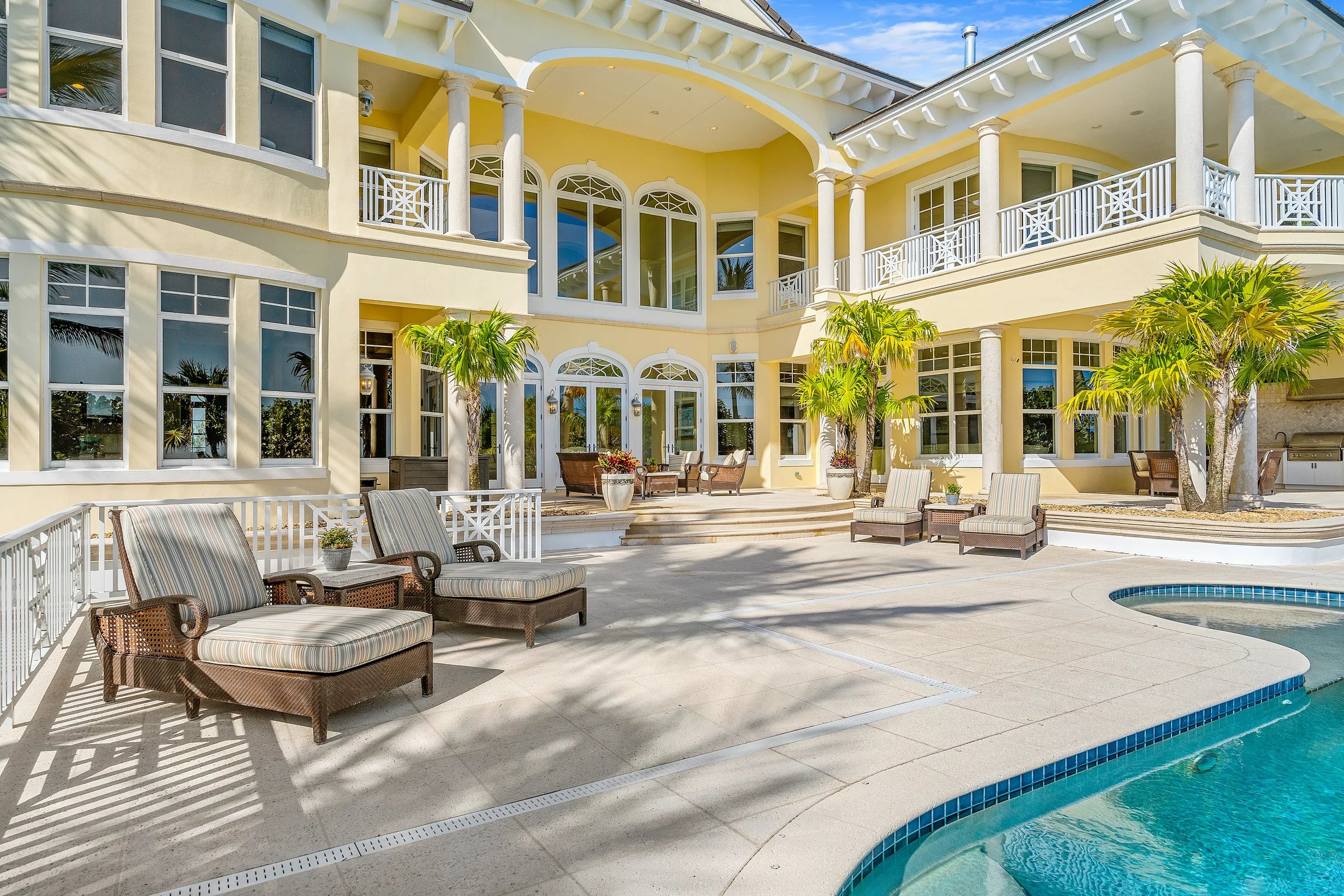 Pool with rear facade backdrop