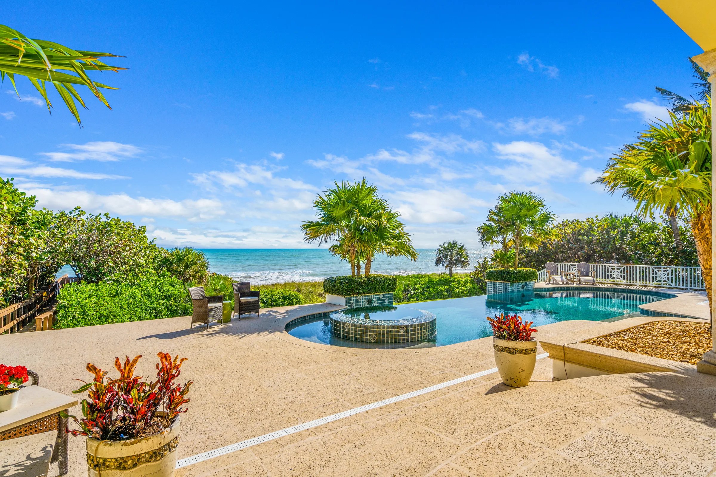 Outdoor wet bar and grill nook at the summer kitchen on the covered oceanfront lanai at 211 Beachside Drive